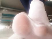 Public Shoeplay - Latina Taking off nylon socks and Sneakers
