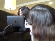 Businesswoman Aine is preparing a business report when she realizes her feet are feeling a bit sore