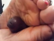 Ebony gives footjob