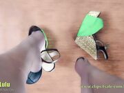 On the table dangling in nylons!